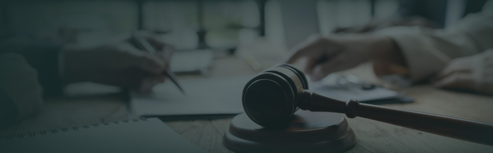 Gavel and legal documents on a desk — professional legal setting